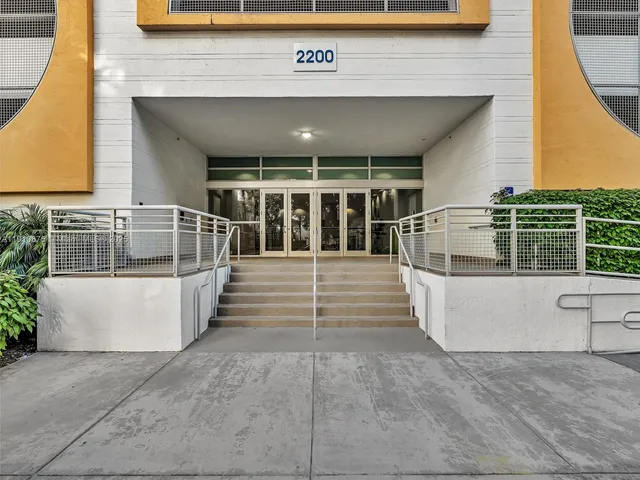a swimming pool with outdoor seating and yard
