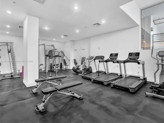 a view of a room with gym equipment