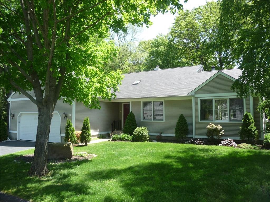 2 Canterbury Road, Unit 2 Hamden, CT 06514 - Photo 1 of 1 a view of a house with backyard garden and a tree
