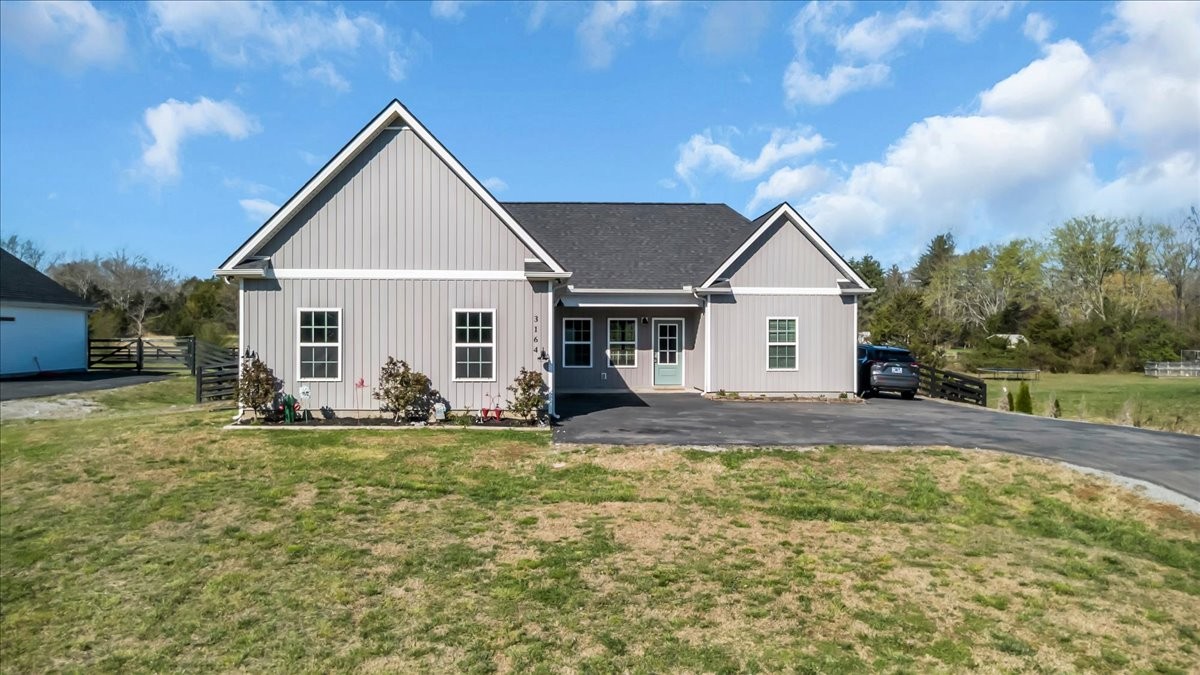 3164 Rucker Road Christiana, TN 37037 - Photo 1 of 67 a view of a house with a yard