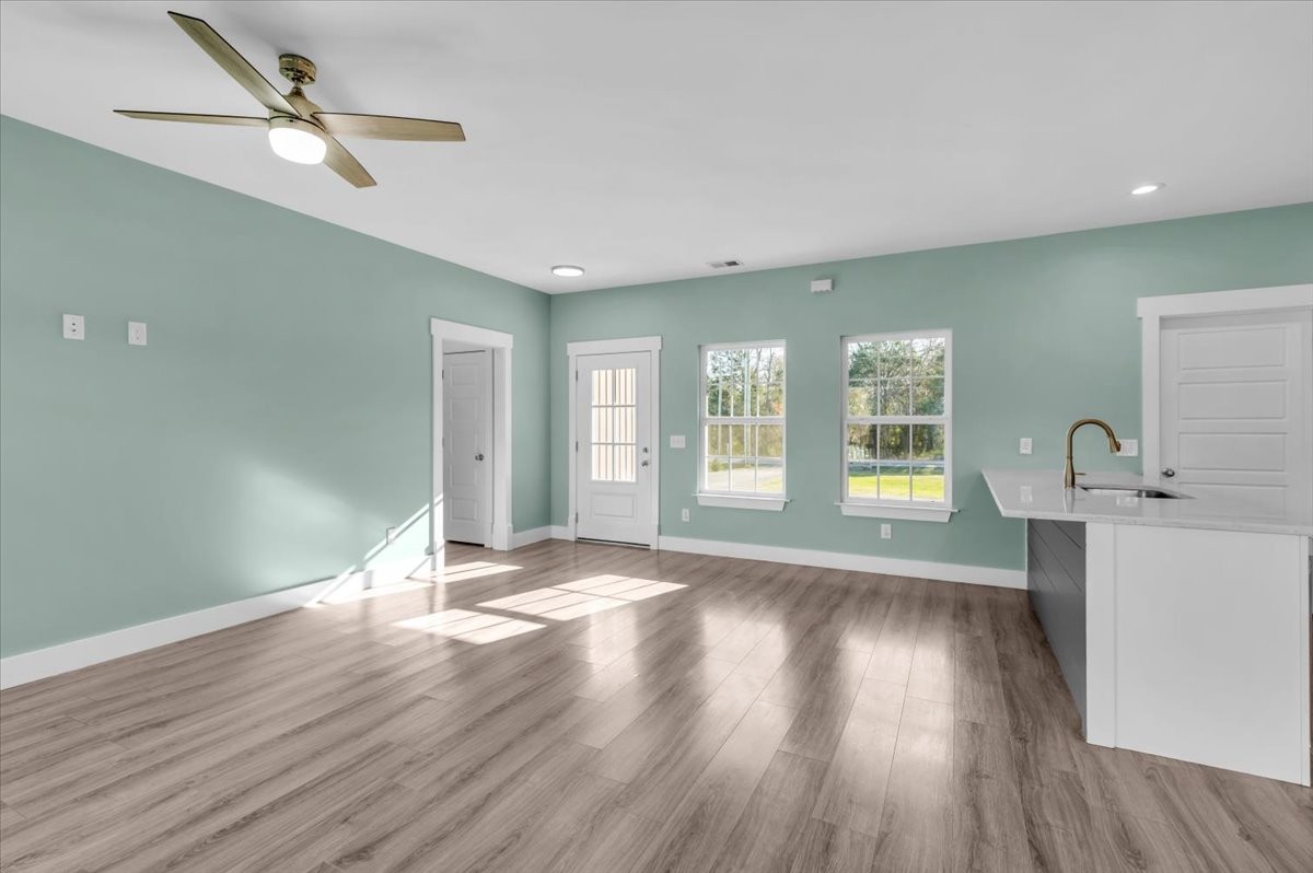 3164 Rucker Road Christiana, TN 37037 - Photo 11 of 67 a view of an empty room with a window and wooden floor