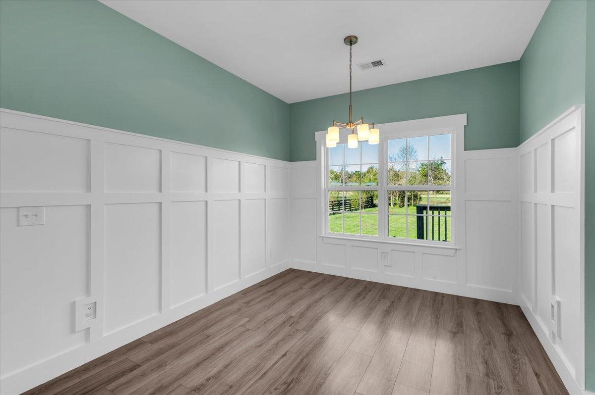 3164 Rucker Road Christiana, TN 37037 - Photo 14 of 67 a view of a room with window wooden floor and chandelier