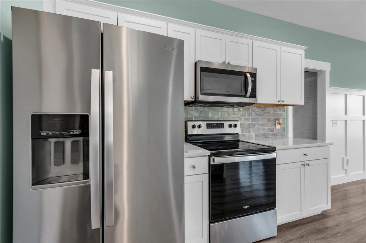 3164 Rucker Road Christiana, TN 37037 - Photo 22 of 67 a kitchen with stainless steel appliances and refrigerator