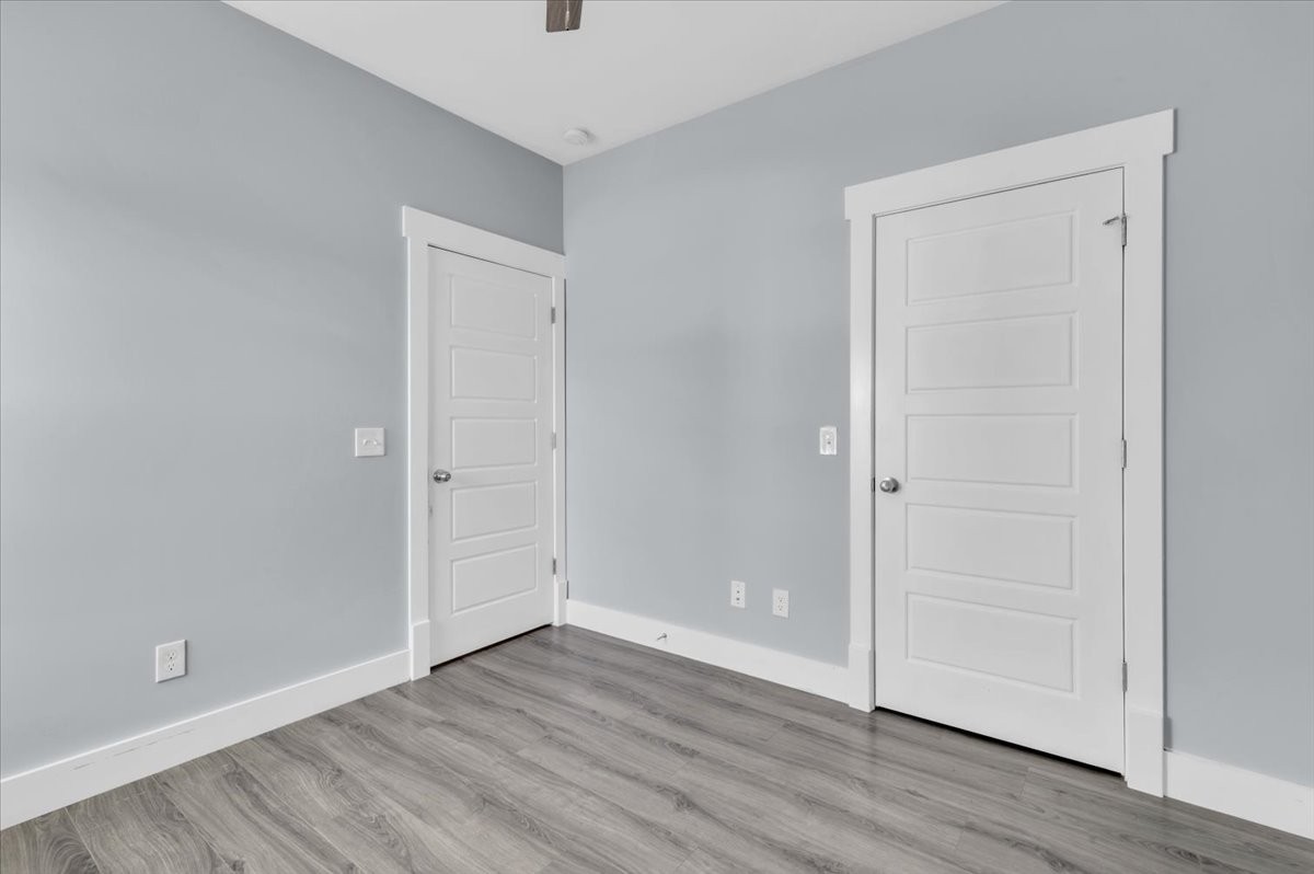 3164 Rucker Road Christiana, TN 37037 - Photo 32 of 67 a view of an empty room with wooden floor