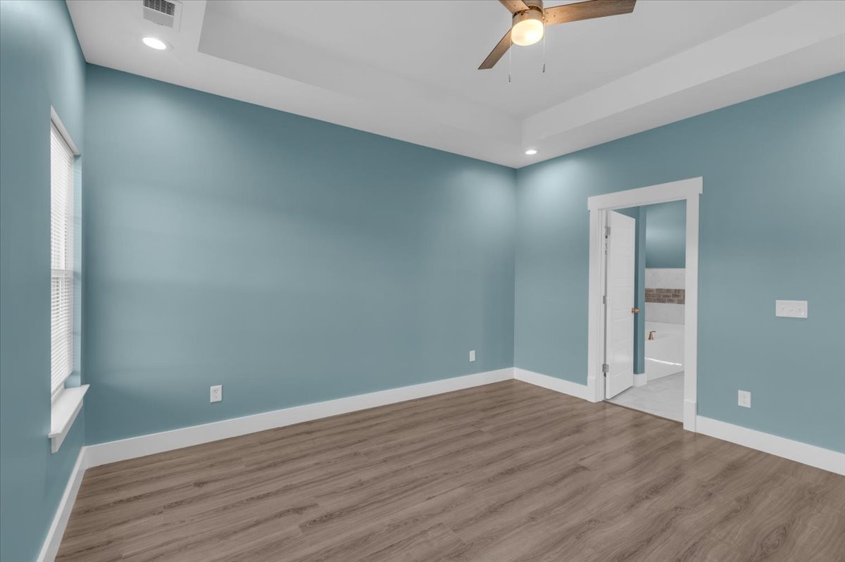 3164 Rucker Road Christiana, TN 37037 - Photo 34 of 67 a view of an empty room with window and wooden floor