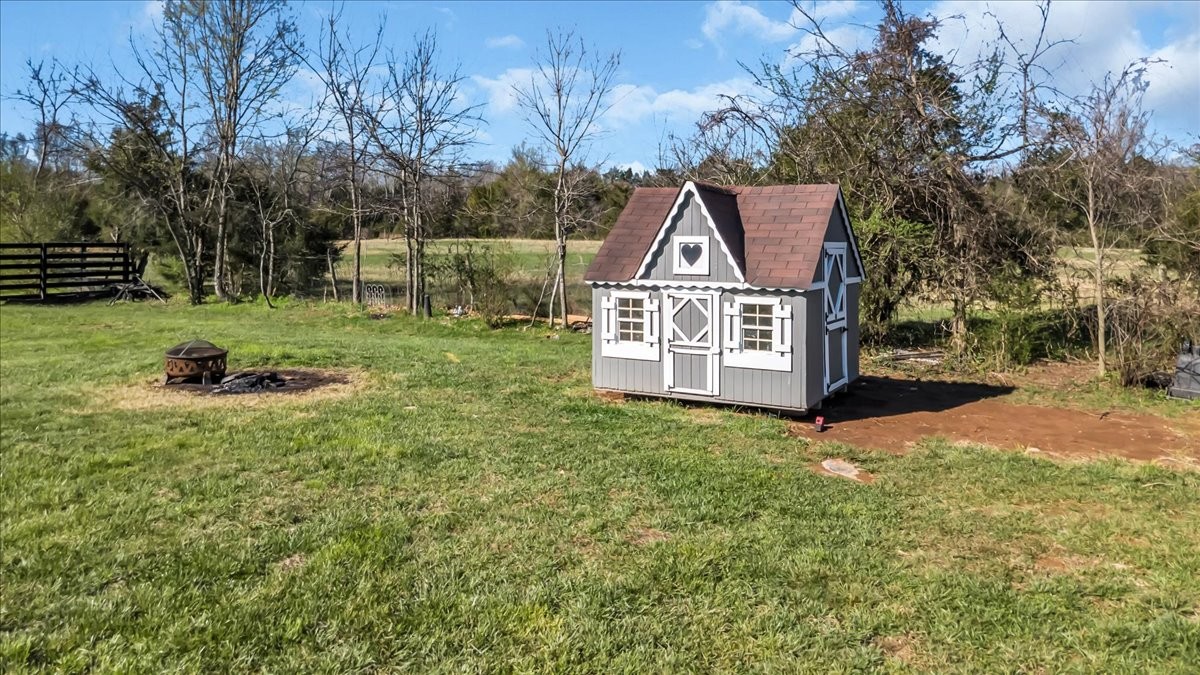 3164 Rucker Road Christiana, TN 37037 - Photo 47 of 67 a front view of a house with garden