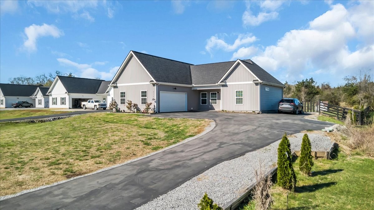 3164 Rucker Road Christiana, TN 37037 - Photo 54 of 67 a front view of a house with garden