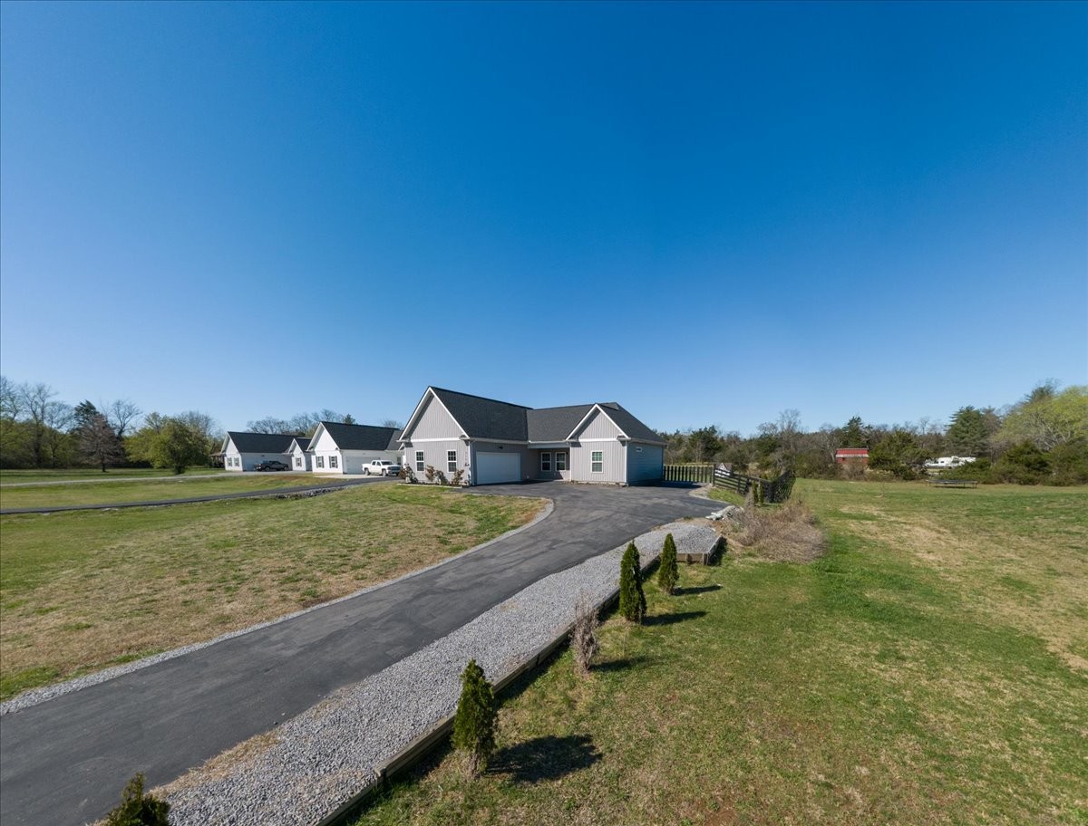 3164 Rucker Road Christiana, TN 37037 - Photo 59 of 67 a view of a lake with houses