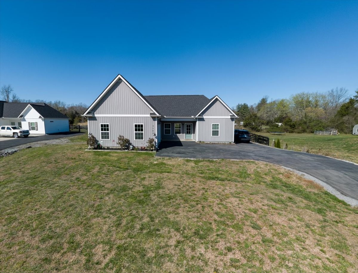 3164 Rucker Road Christiana, TN 37037 - Photo 60 of 67 a view of a house with a yard