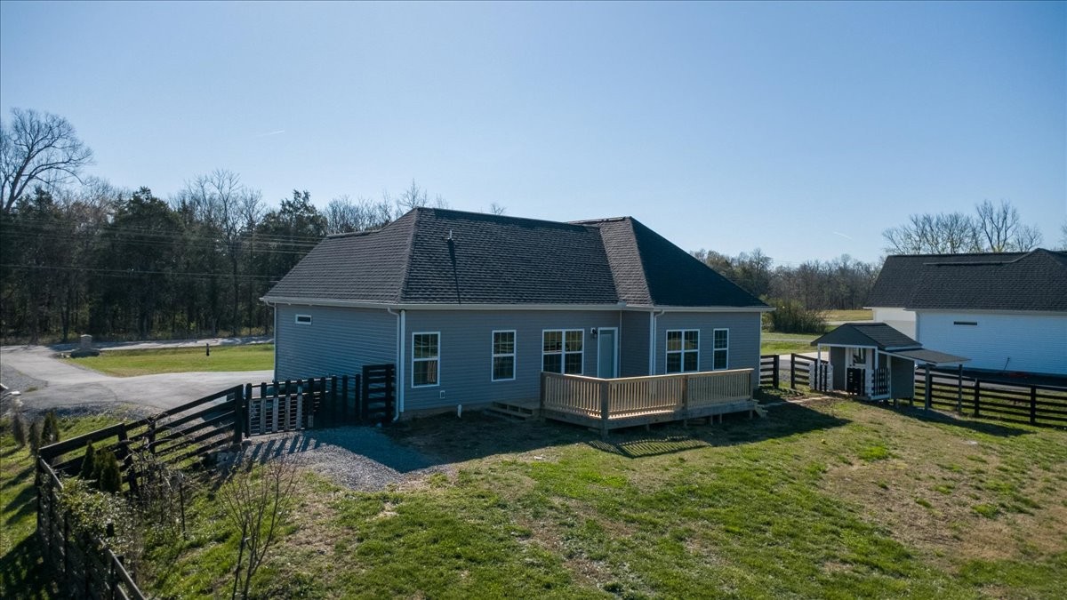 3164 Rucker Road Christiana, TN 37037 - Photo 62 of 67 a view of a house with swimming pool and a yard