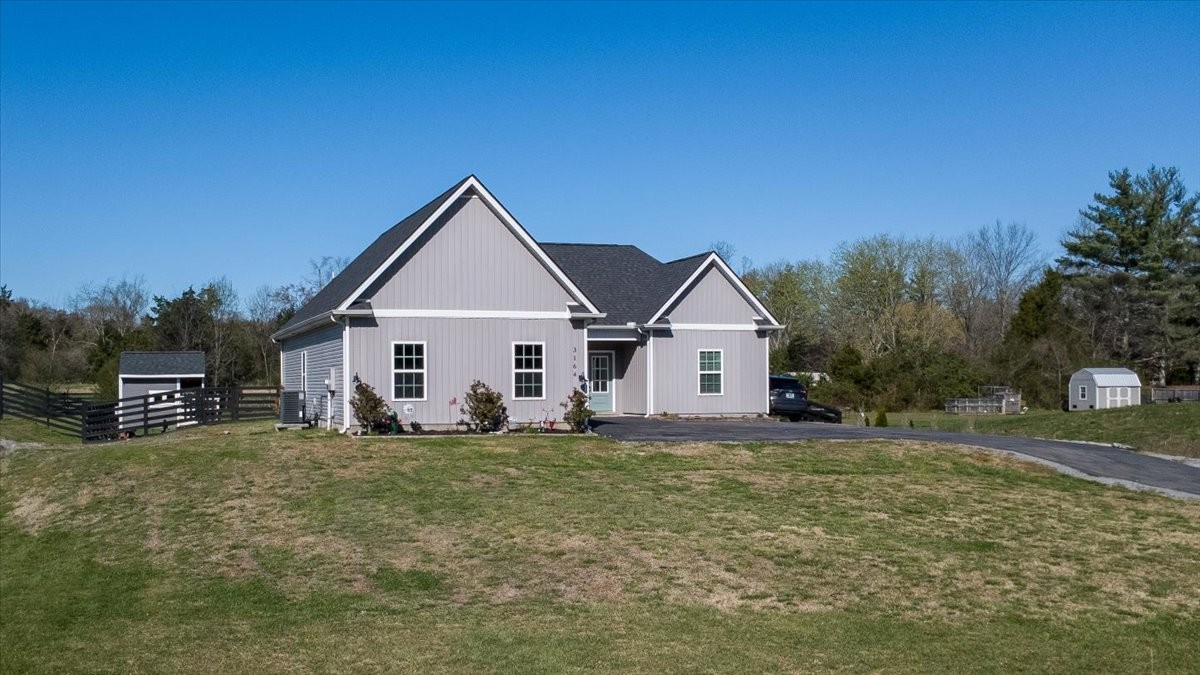 3164 Rucker Road Christiana, TN 37037 - Photo 67 of 67 a view of a house with a yard