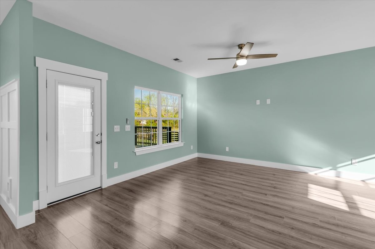 3164 Rucker Road Christiana, TN 37037 - Photo 8 of 67 a view of an empty room with wooden floor and a window