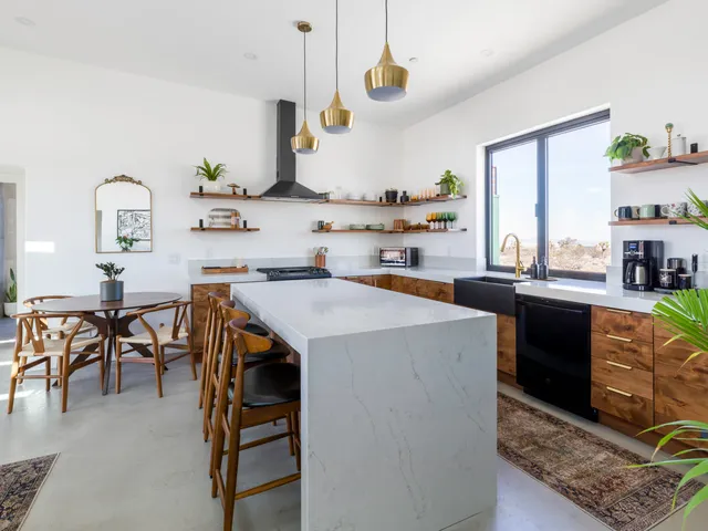 a bedroom with a bed and a mirror