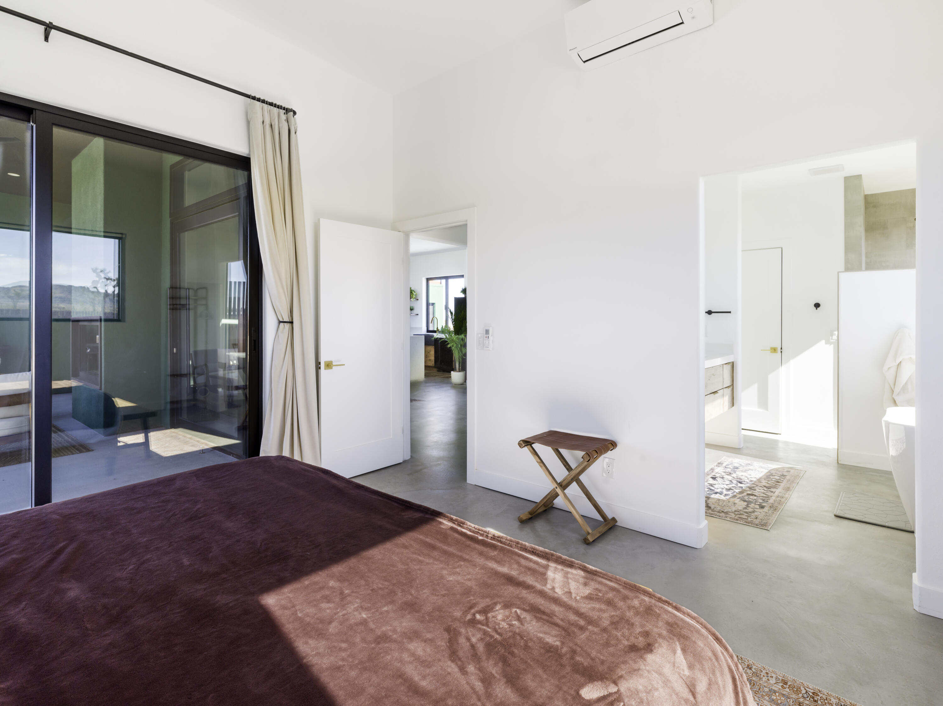 59130 Reche Road Landers, CA 92285 - Photo 22 of 71 a bedroom with a bed and chair