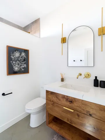 a view of a chairs and table in the patio