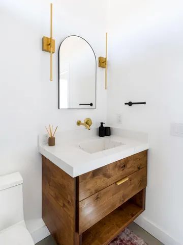 a terrace of a house with outdoor seating