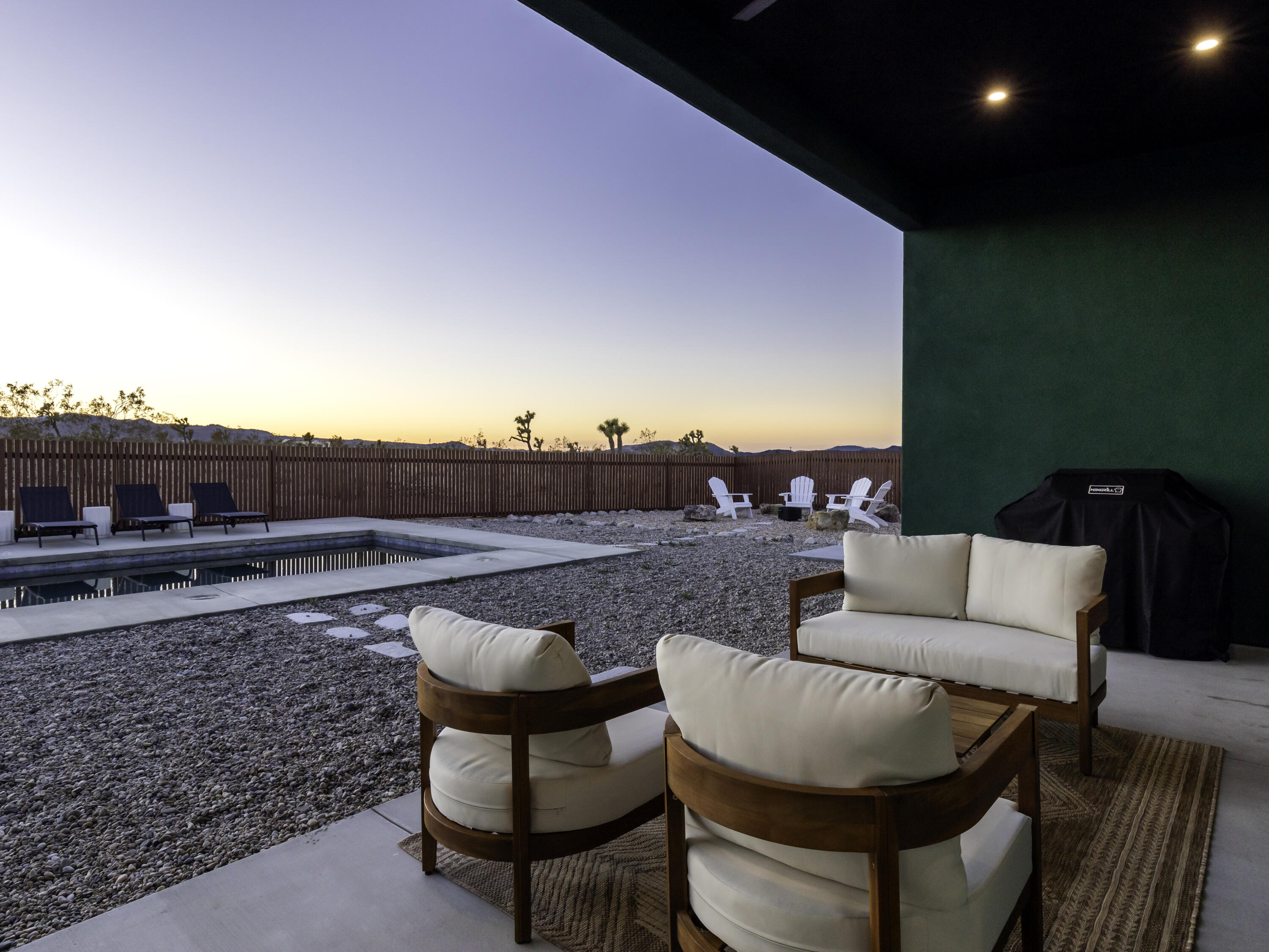 59130 Reche Road Landers, CA 92285 - Photo 42 of 71 a terrace of a house with outdoor seating
