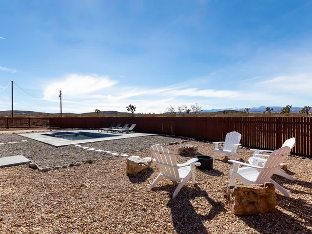 a view of a terrace with furniture and stove