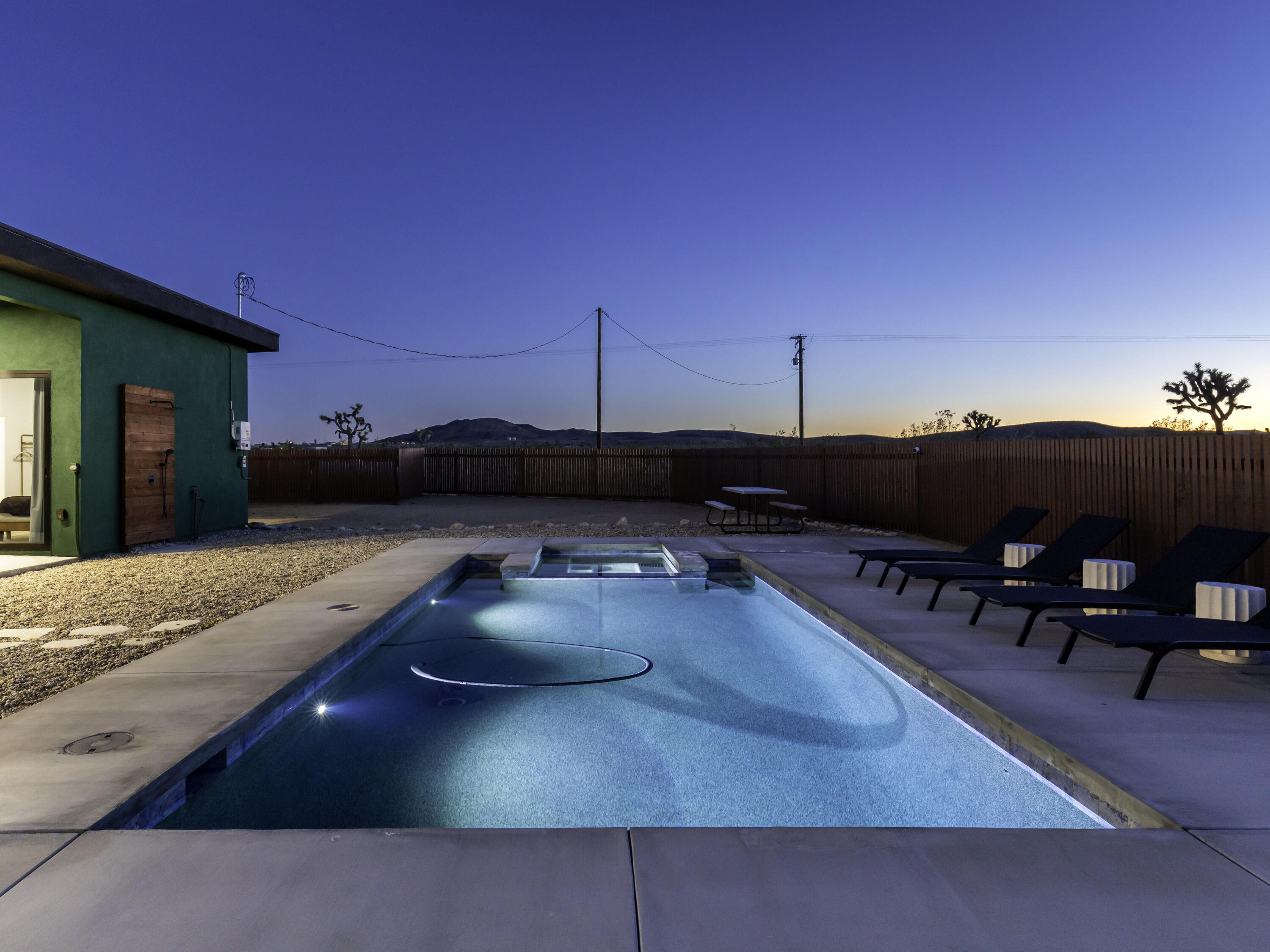 59130 Reche Road Landers, CA 92285 - Photo 53 of 71 a backyard of a house with table and chairs