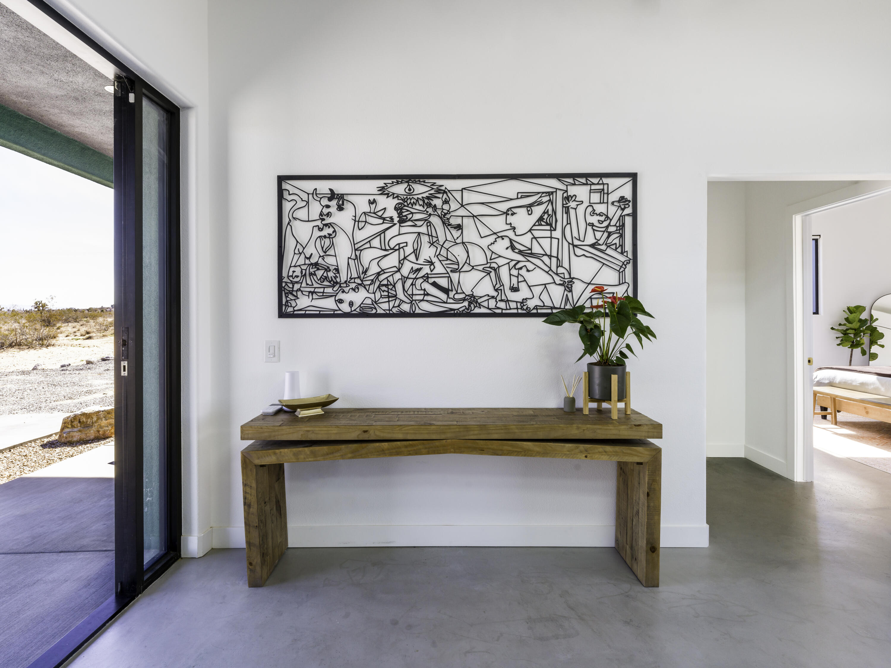 59130 Reche Road Landers, CA 92285 - Photo 6 of 71 a room with a table and a potted plant