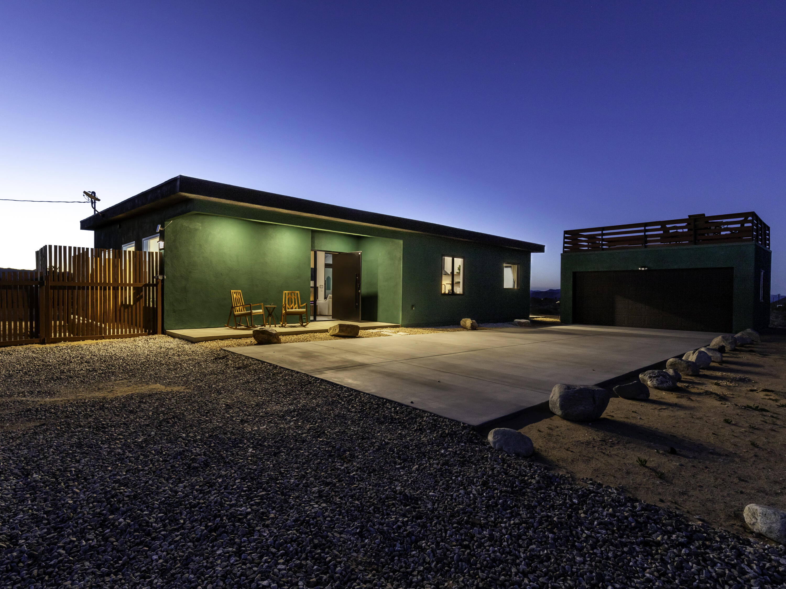 59130 Reche Road Landers, CA 92285 - Photo 62 of 71 a backyard of a house with table and chairs