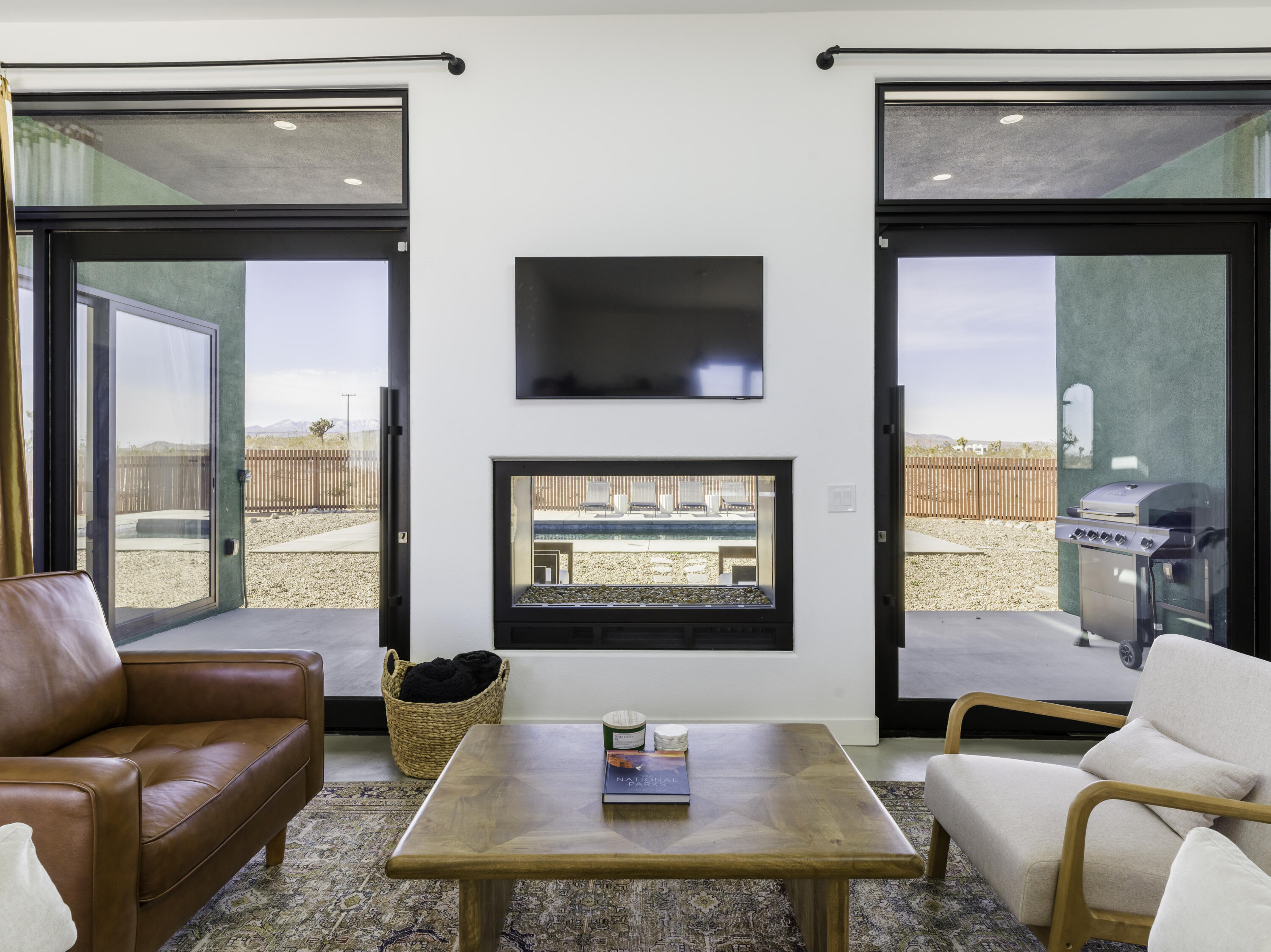59130 Reche Road Landers, CA 92285 - Photo 10 of 69 a living room with furniture and a flat screen tv