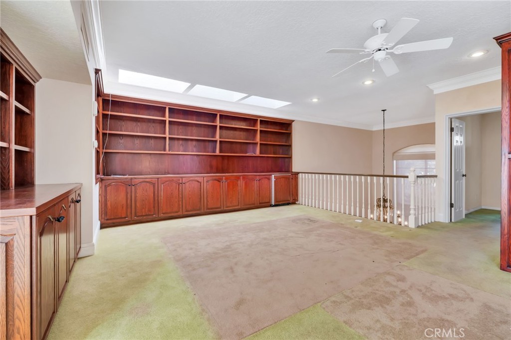 12305 Ridge Circle Los Angeles, CA 90049 - Photo 31 of 59 Den, Office / TV room with a office size refrigerator