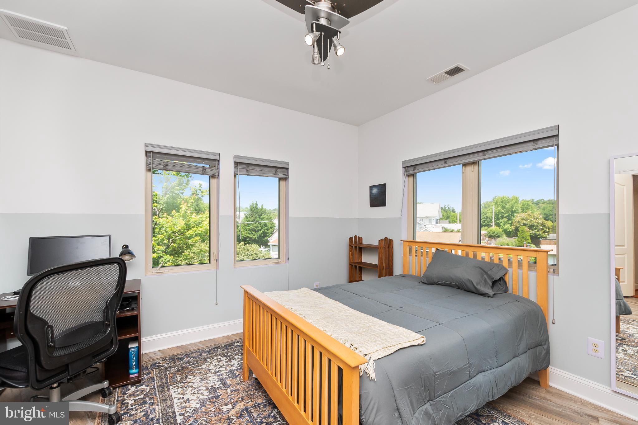 9211 Ox Road Lorton, VA 22079 - Photo 26 of 44 a bedroom with a bed and a window