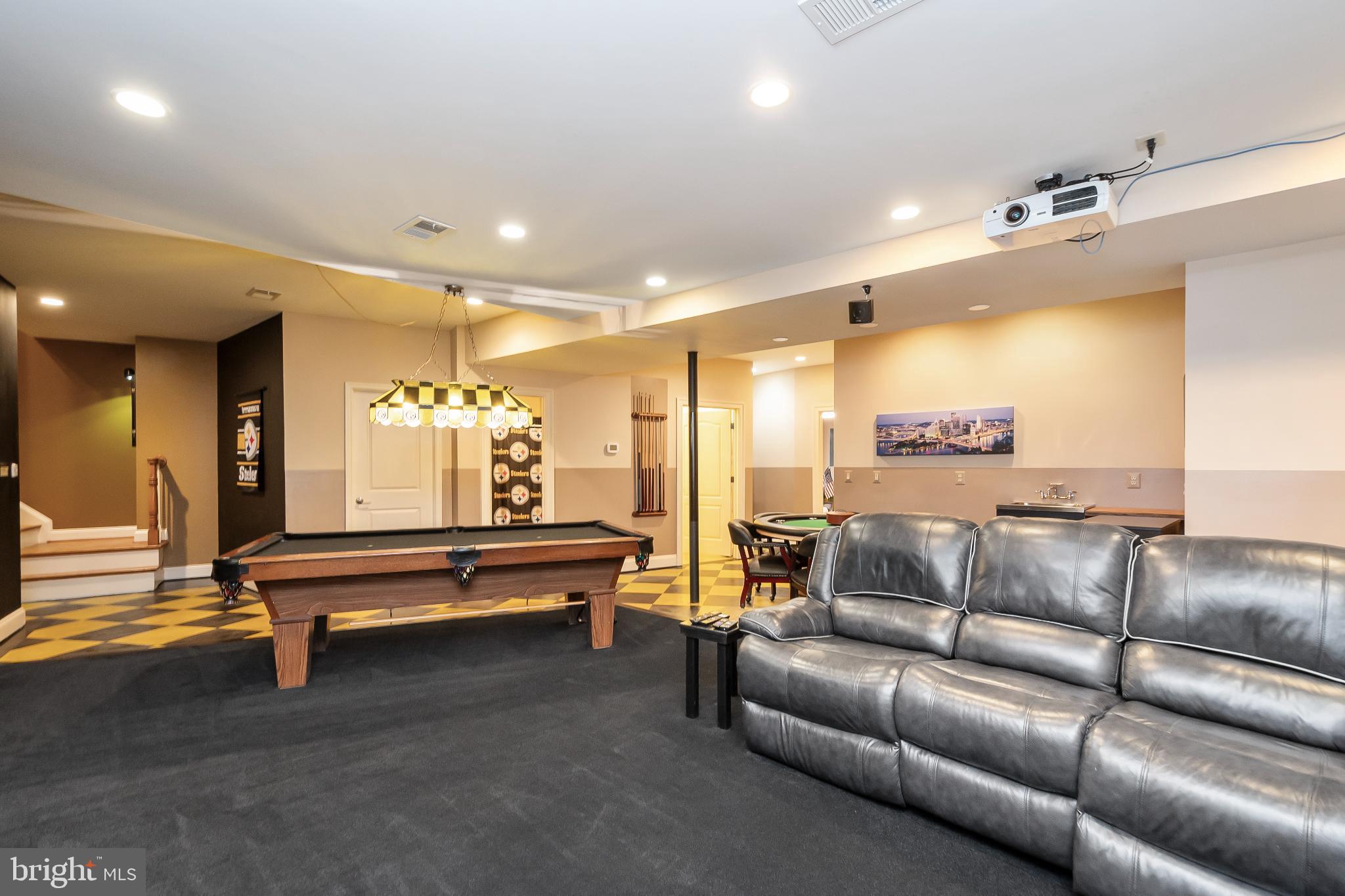 9211 Ox Road Lorton, VA 22079 - Photo 31 of 44 a living room with furniture and a table