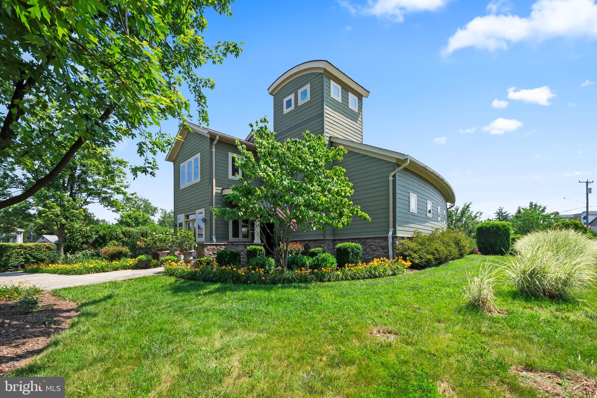 9211 Ox Road Lorton, VA 22079 - Photo 40 of 44 a front view of a house with garden