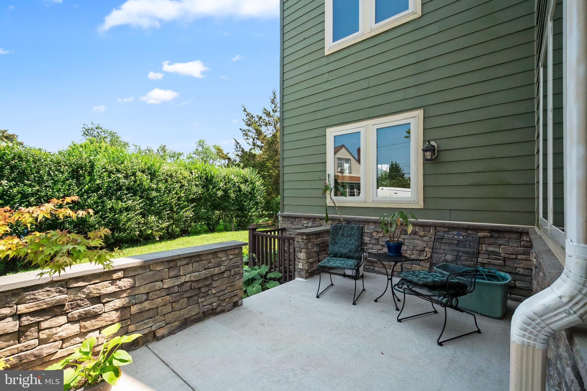 9211 Ox Road Lorton, VA 22079 - Photo 41 of 44 a brick house with chairs in front of it