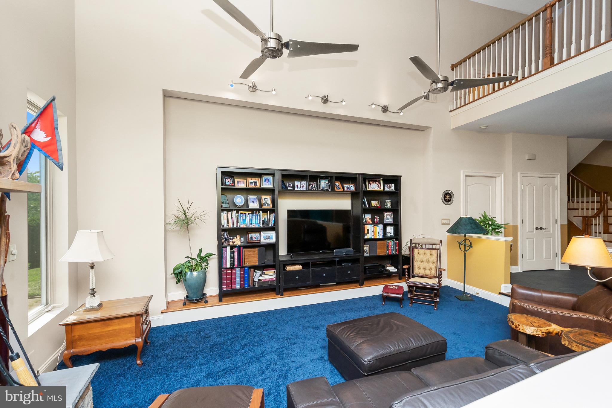 9211 Ox Road Lorton, VA 22079 - Photo 5 of 44 a living room with furniture and a flat screen tv