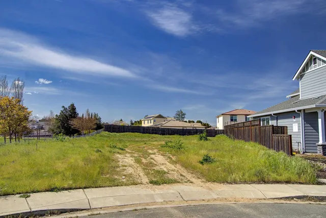 a front view of house with yard and seating