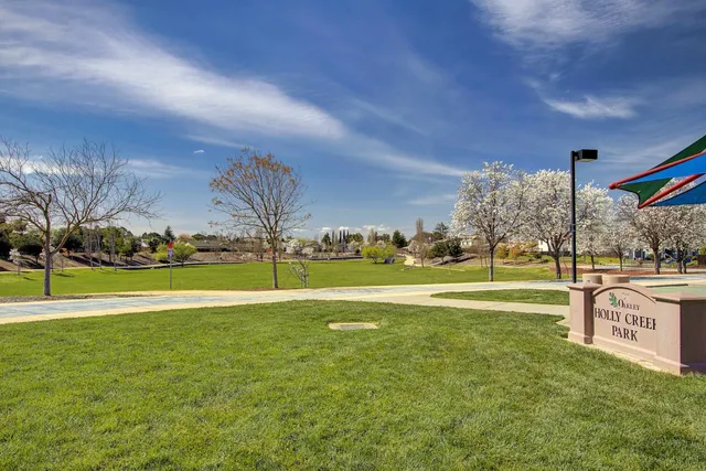 a view of a large swimming pool with an ocean view