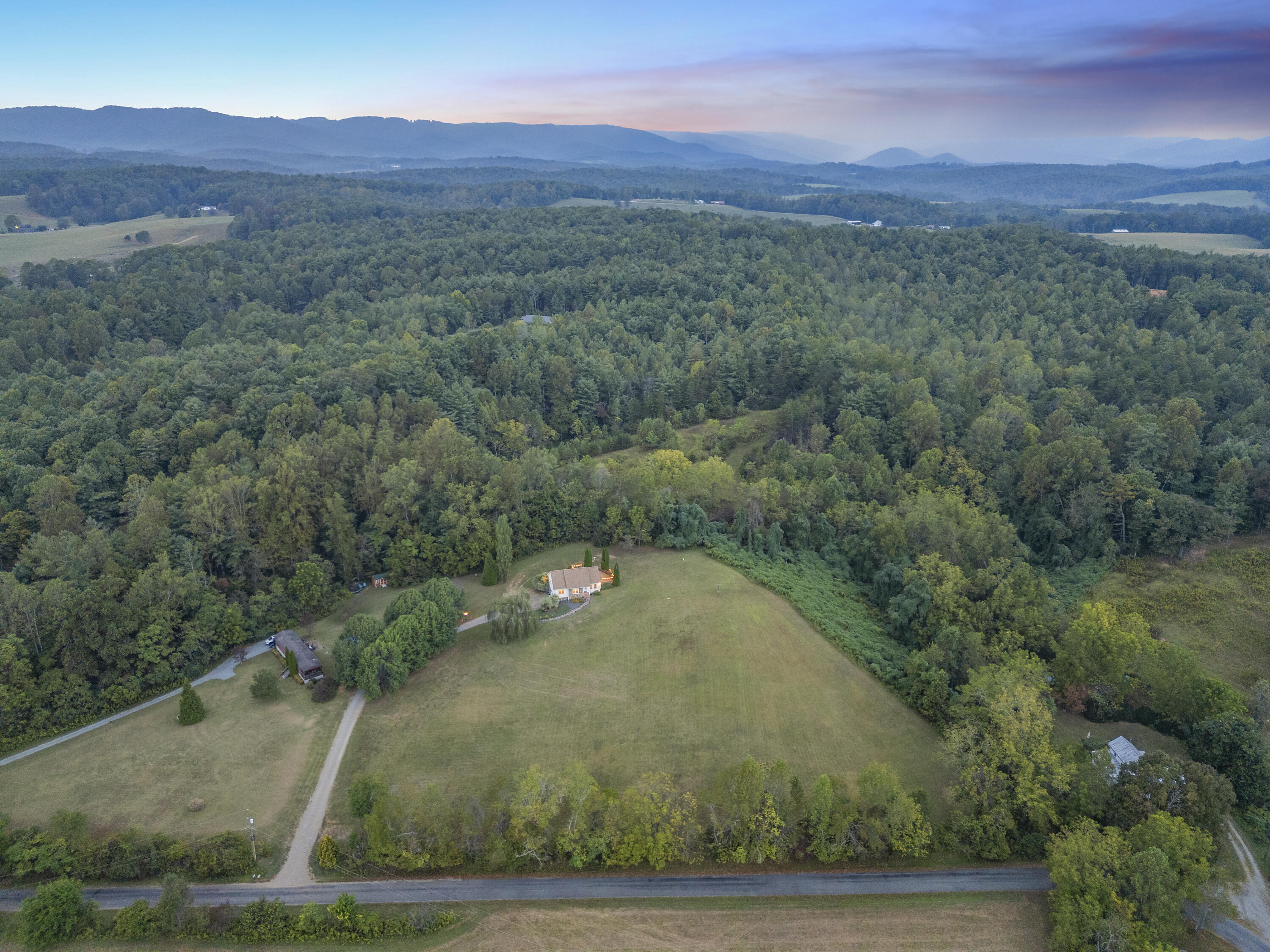 885 Whetstone Road Ferrum, VA 24088 - Photo 60 of 64 a view of a dry yard with green space