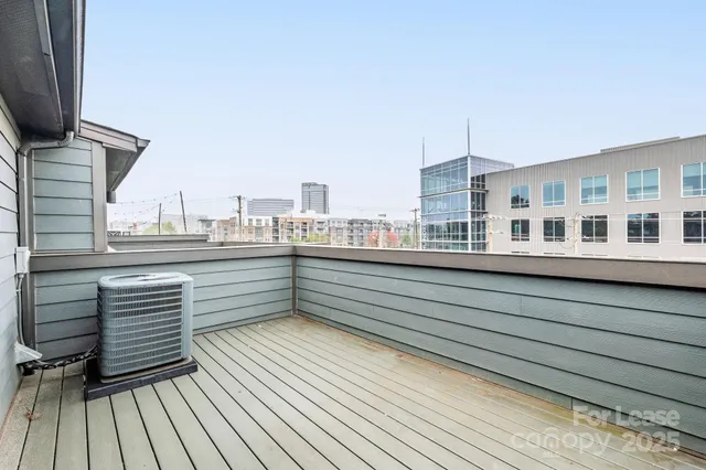 a view of a balcony with city view