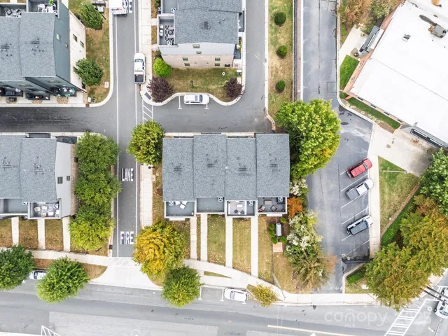 front view of a house with a potted plant