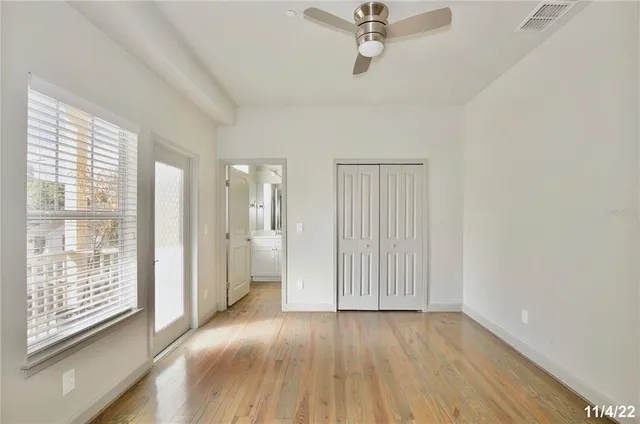 a view of an empty room with a window
