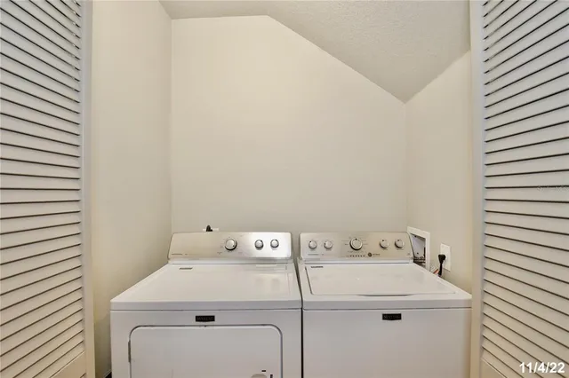 a utility room with dryer and washer