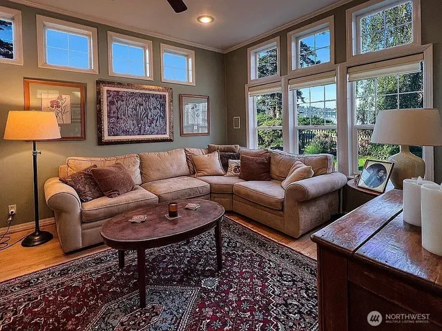 a living room with furniture and a window