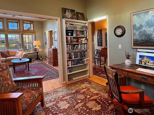 a view of a workspace with furniture