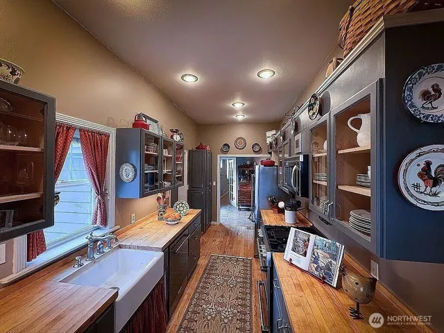 a room with furniture and wooden floor