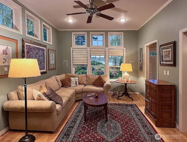 a living room with furniture and a window