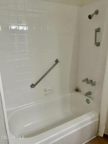 a bathroom with a bathtub