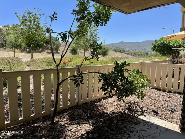 a view of a lake from a yard