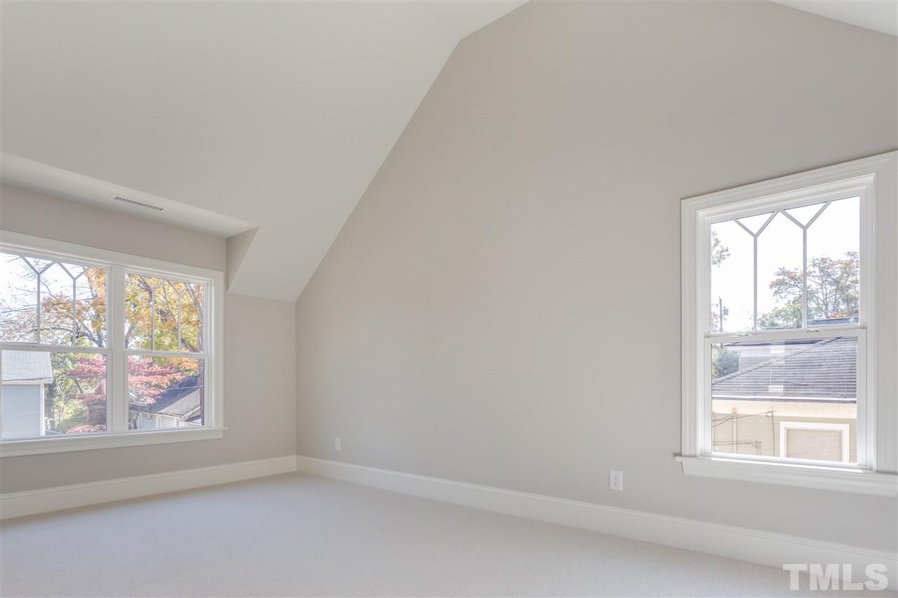 1307 Filmore Street Raleigh, NC 27605 - Photo 19 of 24 All Bedrooms have walk-in closets with custom shelving & stainless steel rods!