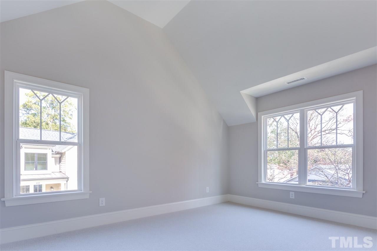 1307 Filmore Street Raleigh, NC 27605 - Photo 20 of 24 All Bedrooms have walk-in closets with custom shelving & stainless steel rods!