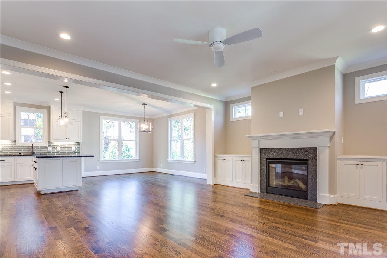 1307 Filmore Street Raleigh, NC 27605 - Photo 8 of 24 Great Room with gas fireplace and matching custom built-ins on either side. Pre-wired for speakers!