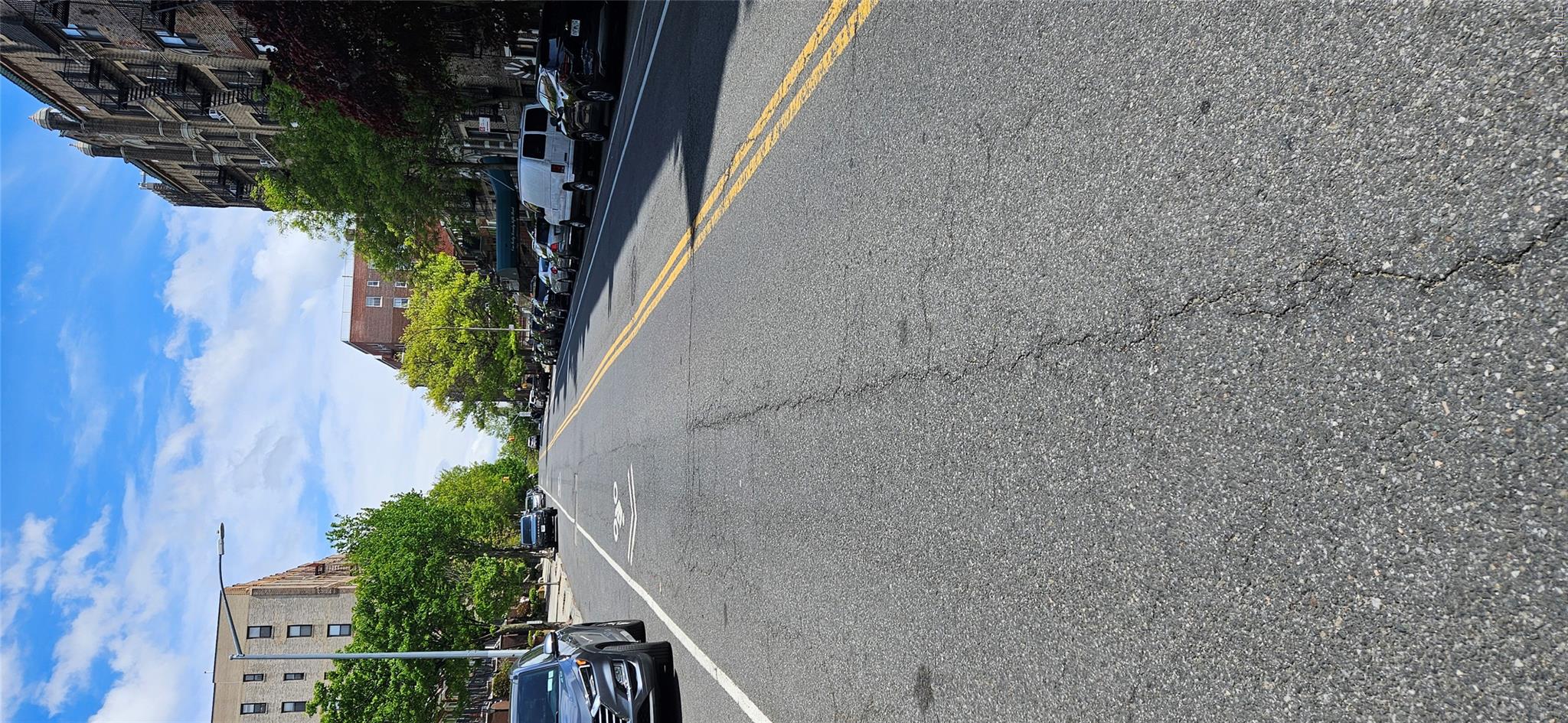 130 Bay Ridge Parkway, Unit 4E Brooklyn, NY 11209 - Photo 2 of 12 a view of a street with a cars parked on the road