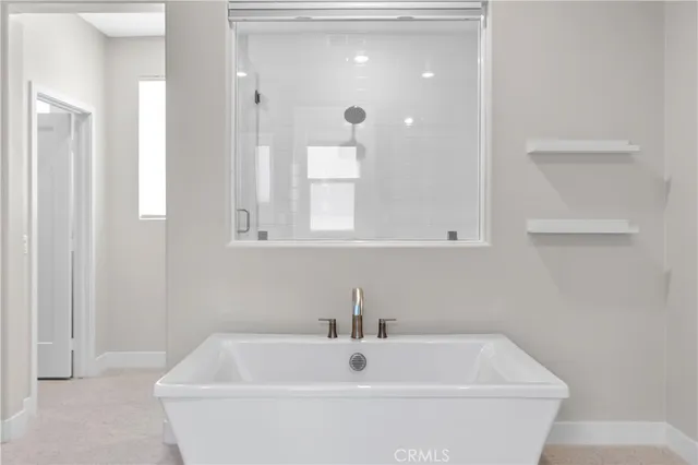 a bathroom with a white tub